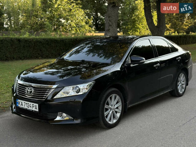 Черный Тойота Камри, объемом двигателя 2.5 л и пробегом 136 тыс. км за 14300 $, фото 1 на Automoto.ua