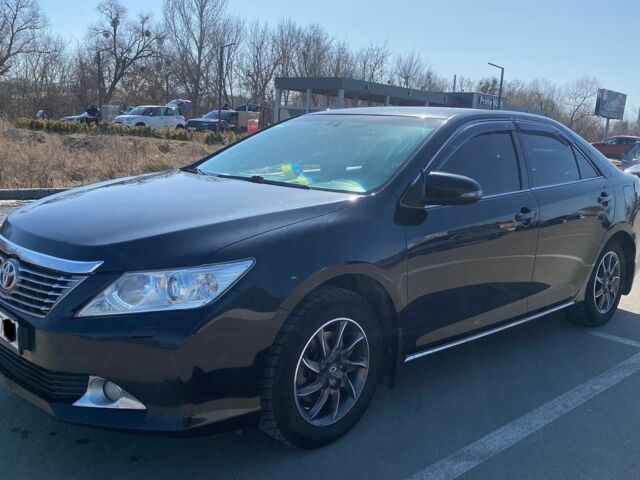Черный Тойота Камри, объемом двигателя 2.5 л и пробегом 355 тыс. км за 12500 $, фото 1 на Automoto.ua