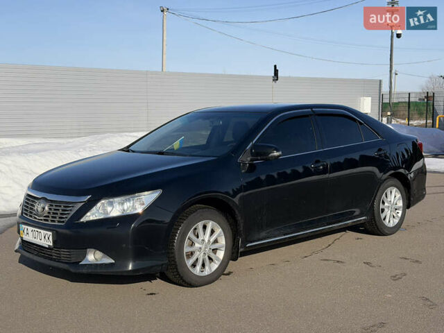 Черный Тойота Камри, объемом двигателя 2.49 л и пробегом 235 тыс. км за 13900 $, фото 1 на Automoto.ua