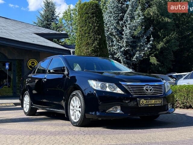 Черный Тойота Камри, объемом двигателя 2.49 л и пробегом 170 тыс. км за 12500 $, фото 1 на Automoto.ua