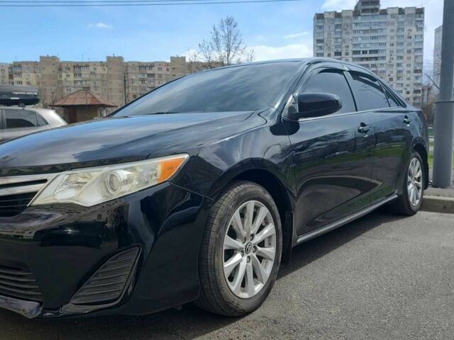 Черный Тойота Камри, объемом двигателя 2.5 л и пробегом 290 тыс. км за 9500 $, фото 1 на Automoto.ua