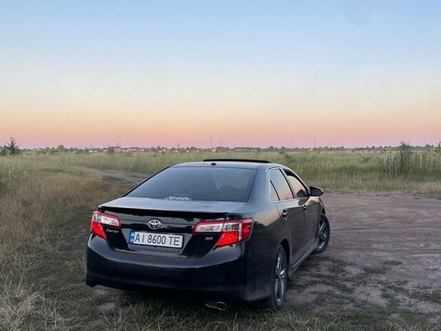 Чорний Тойота Камрі, об'ємом двигуна 2.5 л та пробігом 264 тис. км за 10000 $, фото 1 на Automoto.ua
