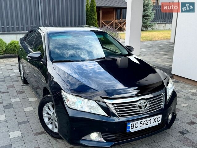 Чорний Тойота Камрі, об'ємом двигуна 2.5 л та пробігом 180 тис. км за 14440 $, фото 1 на Automoto.ua
