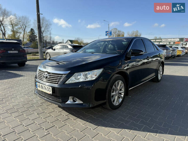 Чорний Тойота Камрі, об'ємом двигуна 2.49 л та пробігом 305 тис. км за 11800 $, фото 1 на Automoto.ua