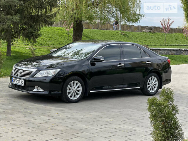 Черный Тойота Камри, объемом двигателя 2.5 л и пробегом 162 тыс. км за 16500 $, фото 1 на Automoto.ua