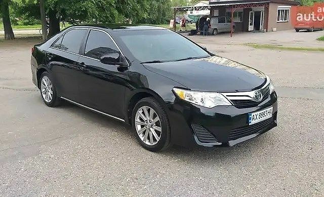 Чорний Тойота Камрі, об'ємом двигуна 2.49 л та пробігом 235 тис. км за 8800 $, фото 1 на Automoto.ua