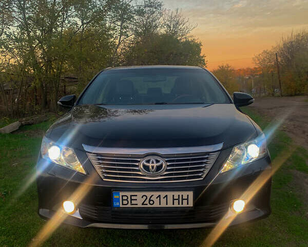 Чорний Тойота Камрі, об'ємом двигуна 2.5 л та пробігом 236 тис. км за 15200 $, фото 1 на Automoto.ua