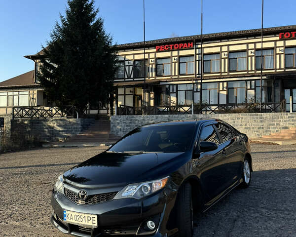 Черный Тойота Камри, объемом двигателя 2.49 л и пробегом 315 тыс. км за 12500 $, фото 1 на Automoto.ua