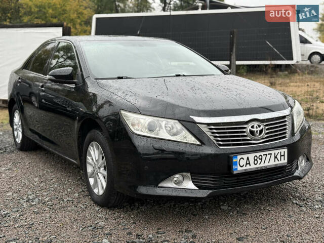Тойота Камри 2013 в Умани на Automoto.ua Черный Тойота Камри, объемом двигателя 2.5 л и пробегом 244 тыс. км за 12450 $, фото 1 на Automoto.ua
