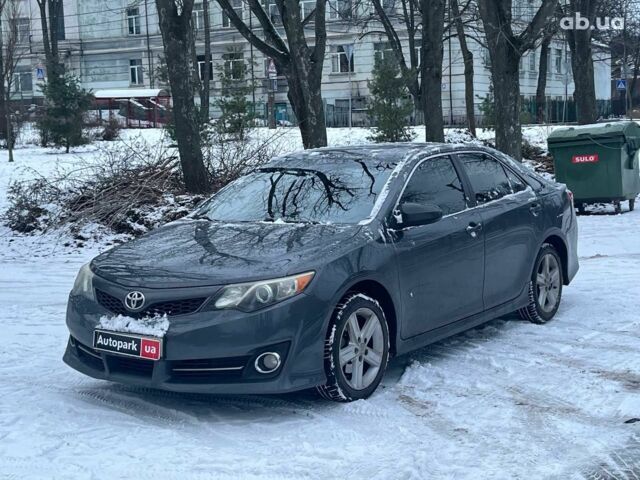 Черный Тойота Камри, объемом двигателя 2.5 л и пробегом 230 тыс. км за 11290 $, фото 1 на Automoto.ua