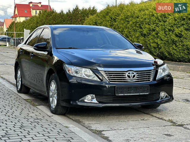 Черный Тойота Камри, объемом двигателя 2.5 л и пробегом 175 тыс. км за 9850 $, фото 1 на Automoto.ua