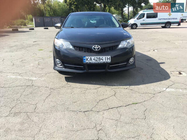 Черный Тойота Камри, объемом двигателя 2.5 л и пробегом 280 тыс. км за 12500 $, фото 1 на Automoto.ua
