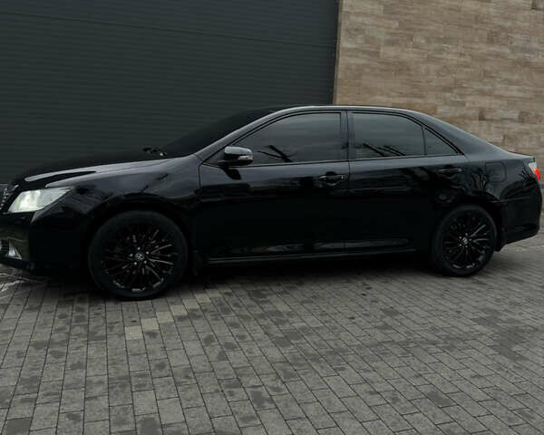 Черный Тойота Камри, объемом двигателя 2.49 л и пробегом 193 тыс. км за 15300 $, фото 1 на Automoto.ua