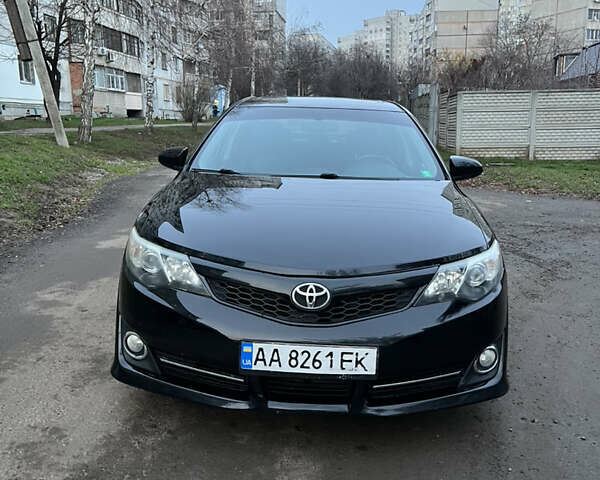 Чорний Тойота Камрі, об'ємом двигуна 2.49 л та пробігом 179 тис. км за 10900 $, фото 1 на Automoto.ua
