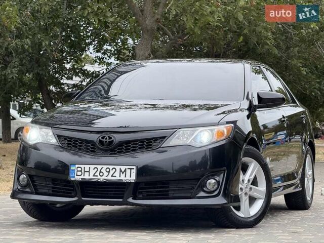 Черный Тойота Камри, объемом двигателя 2.5 л и пробегом 196 тыс. км за 13600 $, фото 1 на Automoto.ua