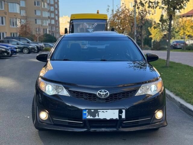 Чорний Тойота Камрі, об'ємом двигуна 2.5 л та пробігом 198 тис. км за 9500 $, фото 1 на Automoto.ua