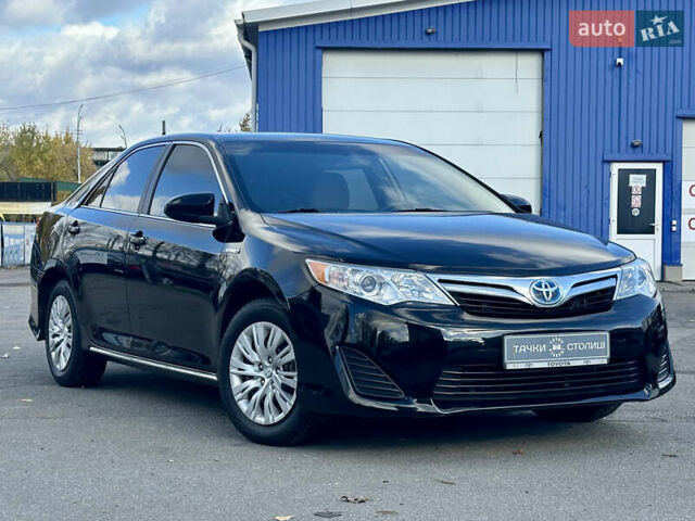 Черный Тойота Камри, объемом двигателя 2.49 л и пробегом 240 тыс. км за 11600 $, фото 1 на Automoto.ua