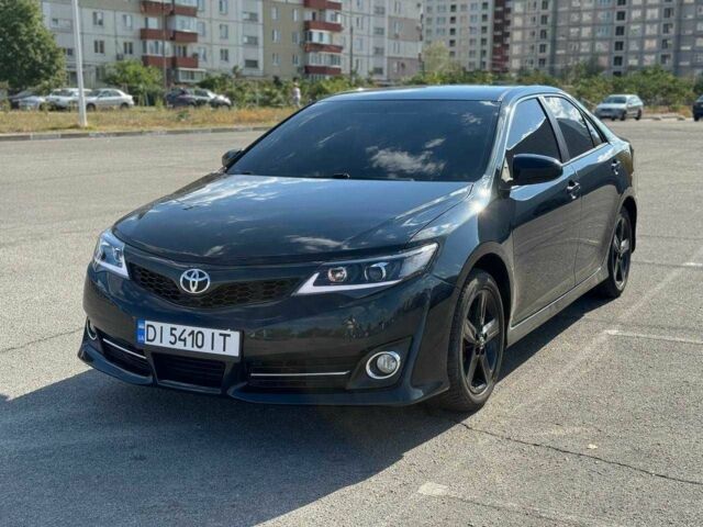 Чорний Тойота Камрі, об'ємом двигуна 2.5 л та пробігом 183 тис. км за 10999 $, фото 1 на Automoto.ua