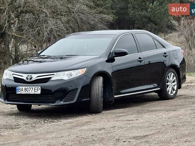 Чорний Тойота Камрі, об'ємом двигуна 2.5 л та пробігом 153 тис. км за 12800 $, фото 1 на Automoto.ua