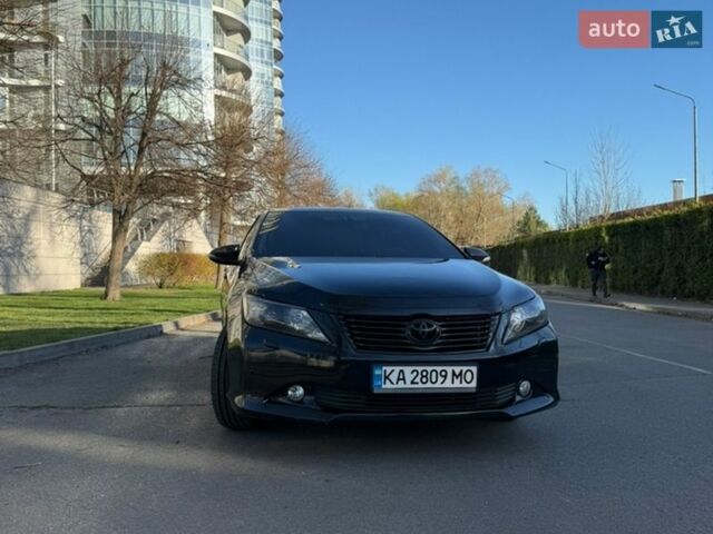 Черный Тойота Камри, объемом двигателя 2.5 л и пробегом 196 тыс. км за 13800 $, фото 1 на Automoto.ua