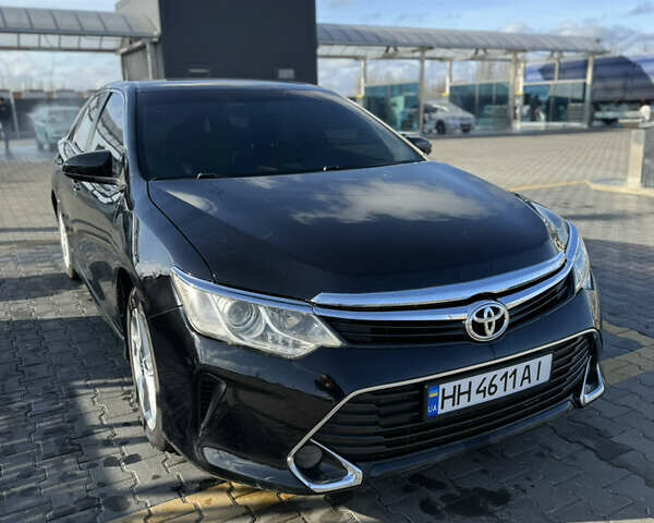 Черный Тойота Камри, объемом двигателя 2.49 л и пробегом 142 тыс. км за 13200 $, фото 1 на Automoto.ua
