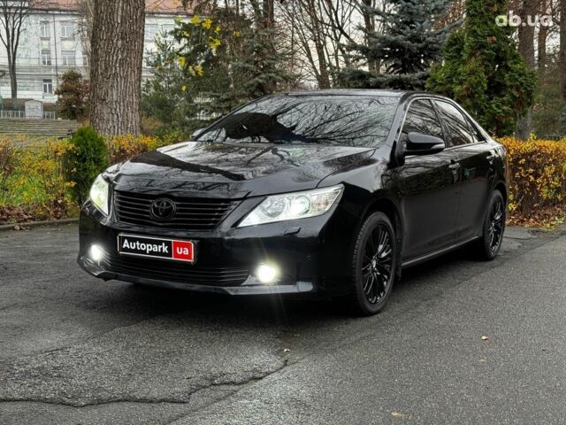Черный Тойота Камри, объемом двигателя 2.5 л и пробегом 257 тыс. км за 13990 $, фото 1 на Automoto.ua