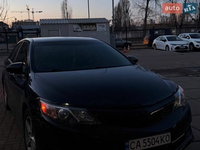 Черный Тойота Камри, объемом двигателя 2.49 л и пробегом 180 тыс. км за 11800 $, фото 1 на Automoto.ua