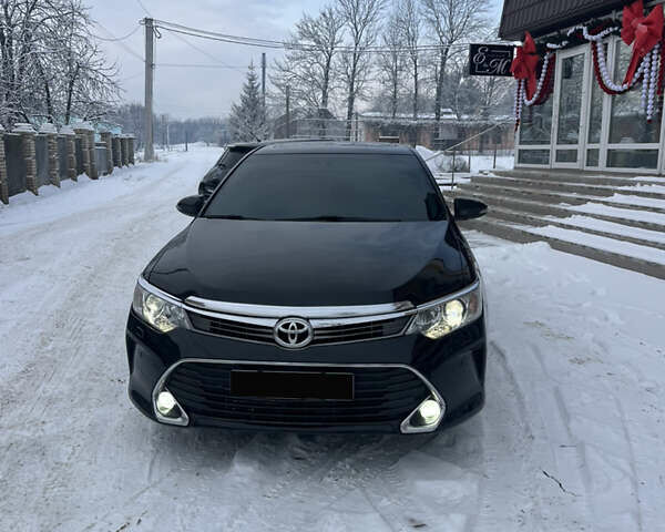 Чорний Тойота Камрі, об'ємом двигуна 2.49 л та пробігом 185 тис. км за 16999 $, фото 1 на Automoto.ua