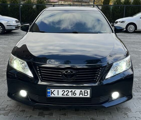 Черный Тойота Камри, объемом двигателя 2.5 л и пробегом 257 тыс. км за 15400 $, фото 1 на Automoto.ua