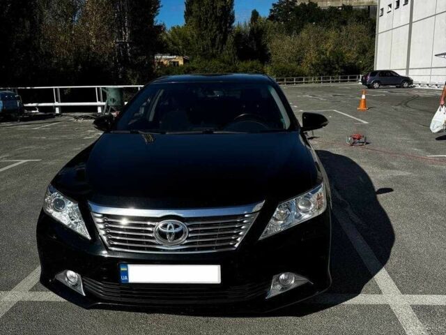 Черный Тойота Камри, объемом двигателя 2.5 л и пробегом 128 тыс. км за 15000 $, фото 1 на Automoto.ua