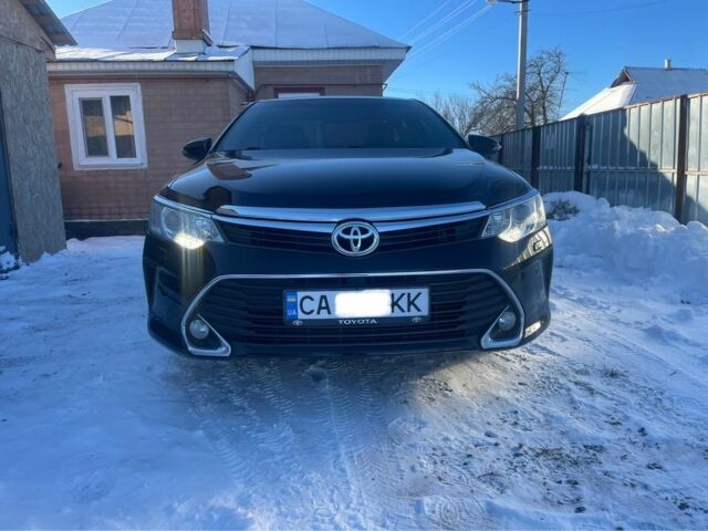 Черный Тойота Камри, объемом двигателя 2.5 л и пробегом 188 тыс. км за 14750 $, фото 1 на Automoto.ua
