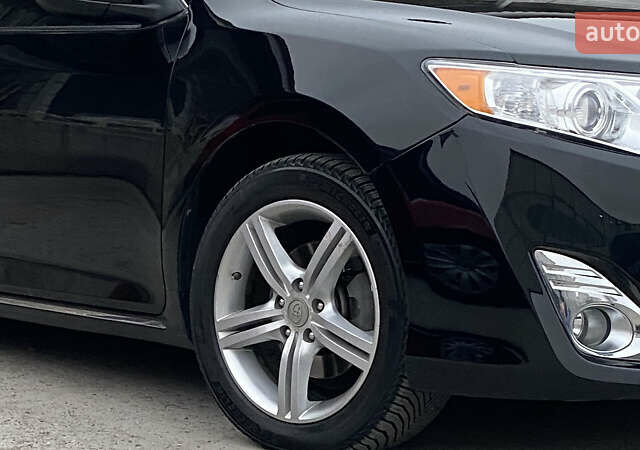 Чорний Тойота Камрі, об'ємом двигуна 2.49 л та пробігом 149 тис. км за 13400 $, фото 1 на Automoto.ua