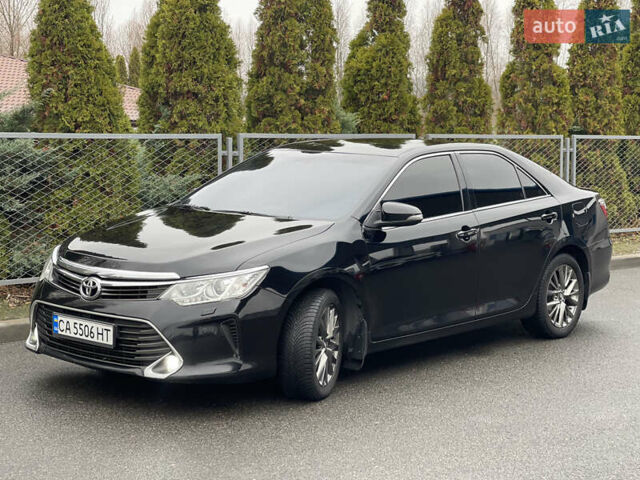 Черный Тойота Камри, объемом двигателя 2.49 л и пробегом 199 тыс. км за 16400 $, фото 1 на Automoto.ua