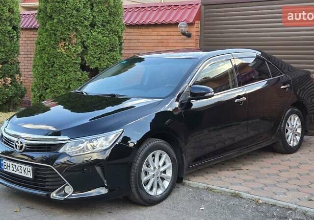 Черный Тойота Камри, объемом двигателя 2.49 л и пробегом 73 тыс. км за 18900 $, фото 1 на Automoto.ua