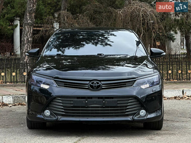 Чорний Тойота Камрі, об'ємом двигуна 2.5 л та пробігом 225 тис. км за 15999 $, фото 1 на Automoto.ua