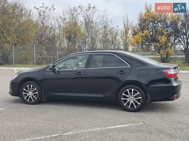 Черный Тойота Камри, объемом двигателя 2.49 л и пробегом 206 тыс. км за 14300 $, фото 1 на Automoto.ua