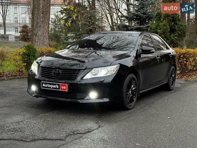 Черный Тойота Камри, объемом двигателя 2.5 л и пробегом 257 тыс. км за 13990 $, фото 1 на Automoto.ua