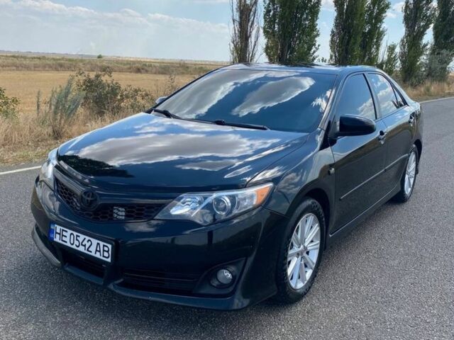 Черный Тойота Камри, объемом двигателя 2.5 л и пробегом 120 тыс. км за 12650 $, фото 1 на Automoto.ua