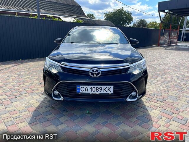 Черный Тойота Камри, объемом двигателя 2.5 л и пробегом 188 тыс. км за 14500 $, фото 1 на Automoto.ua