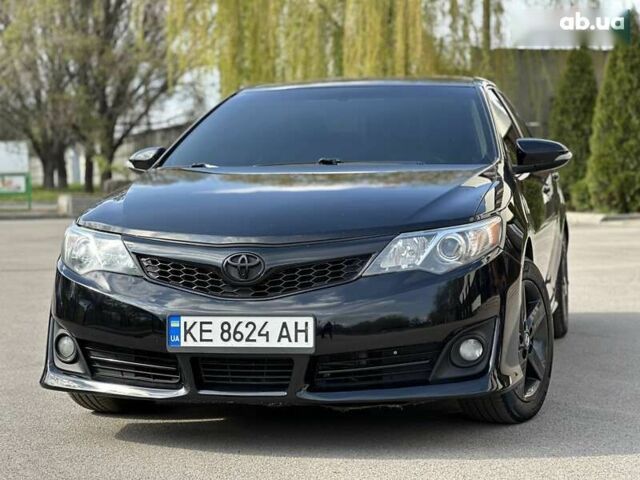 Черный Тойота Камри, объемом двигателя 2.5 л и пробегом 180 тыс. км за 11999 $, фото 1 на Automoto.ua