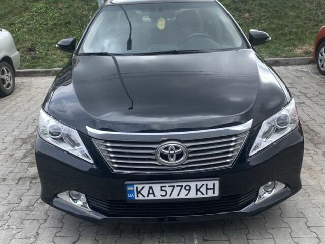Черный Тойота Камри, объемом двигателя 2.5 л и пробегом 155 тыс. км за 12600 $, фото 1 на Automoto.ua