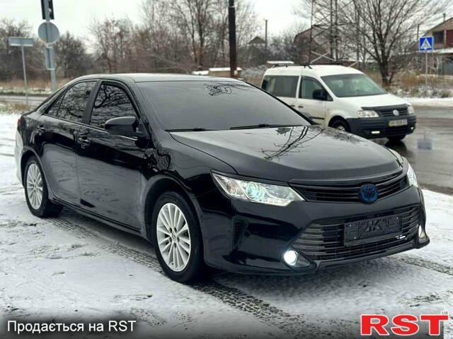 Черный Тойота Камри, объемом двигателя 2.5 л и пробегом 200 тыс. км за 12500 $, фото 1 на Automoto.ua