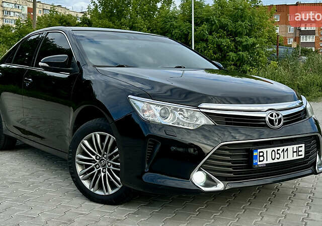 Чорний Тойота Камрі, об'ємом двигуна 2.49 л та пробігом 182 тис. км за 14999 $, фото 1 на Automoto.ua