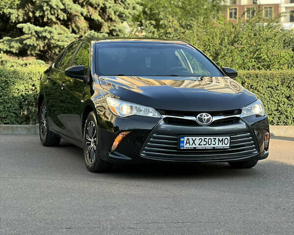 Чорний Тойота Камрі, об'ємом двигуна 2.49 л та пробігом 175 тис. км за 12000 $, фото 1 на Automoto.ua