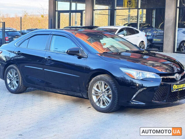 Чорний Тойота Камрі, об'ємом двигуна 2.5 л та пробігом 170 тис. км за 13700 $, фото 1 на Automoto.ua