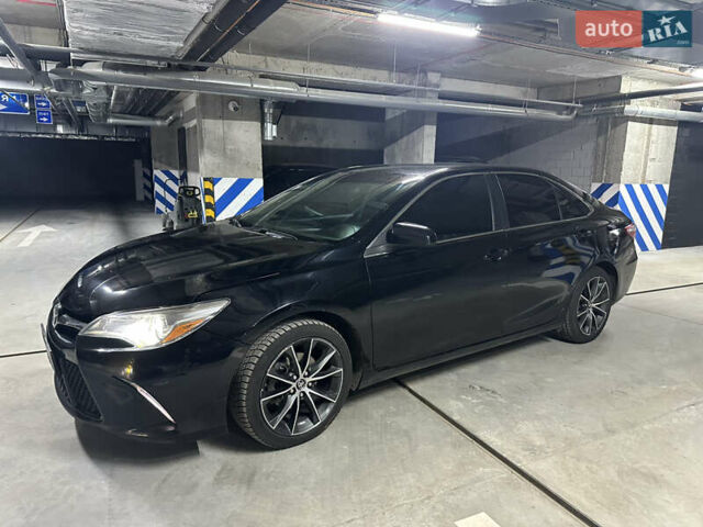 Черный Тойота Камри, объемом двигателя 2.49 л и пробегом 185 тыс. км за 15000 $, фото 1 на Automoto.ua
