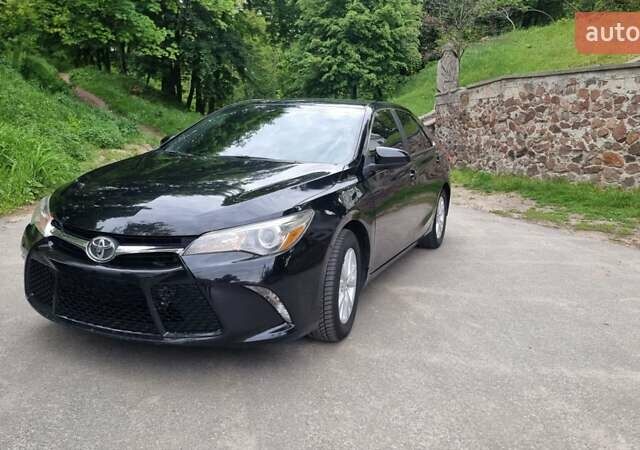 Черный Тойота Камри, объемом двигателя 2.5 л и пробегом 260 тыс. км за 12500 $, фото 1 на Automoto.ua