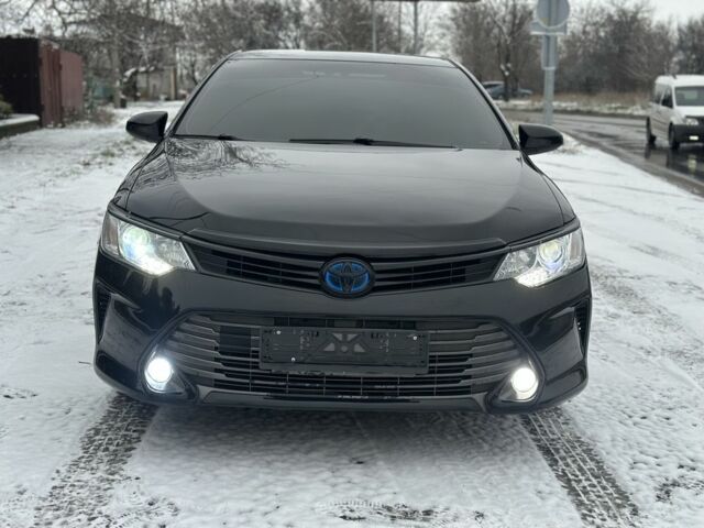 Черный Тойота Камри, объемом двигателя 2.4 л и пробегом 200 тыс. км за 11700 $, фото 1 на Automoto.ua