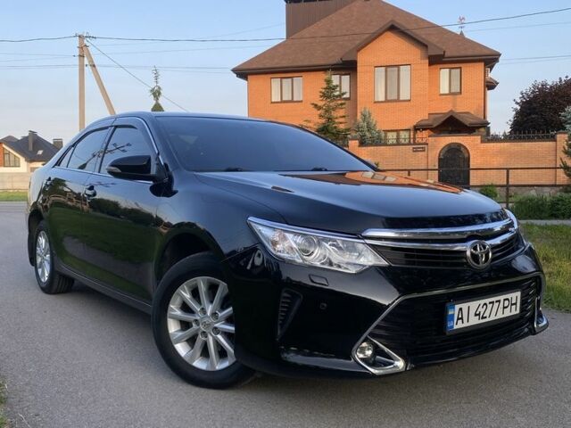 Черный Тойота Камри, объемом двигателя 2.5 л и пробегом 190 тыс. км за 329 $, фото 1 на Automoto.ua