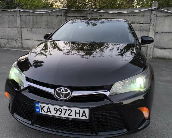 Черный Тойота Камри, объемом двигателя 2.49 л и пробегом 268 тыс. км за 11300 $, фото 1 на Automoto.ua